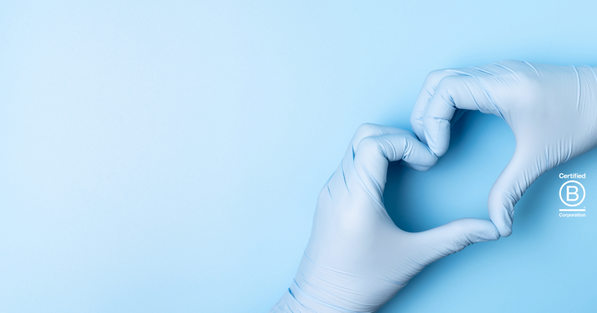 gloved hands in a heart with b corp logo