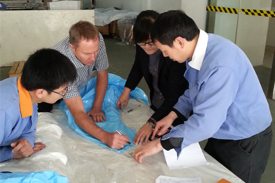 Eagle CEO Developing Disposable Clothing at Factory