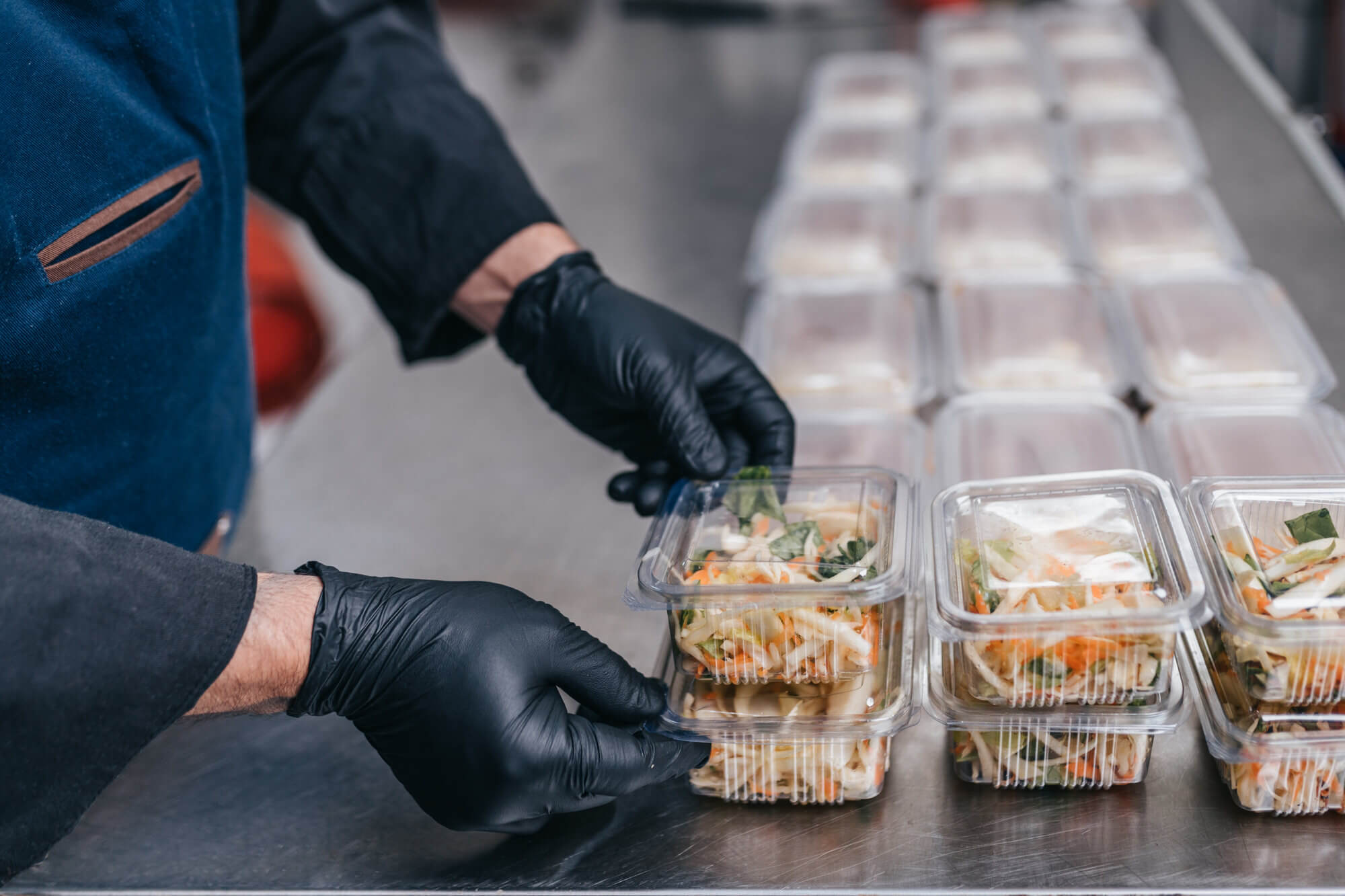 Disposable black nitrile food gloves preparing meals